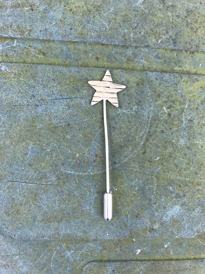 Pin - P03 - Stripey brass snd silver star pin