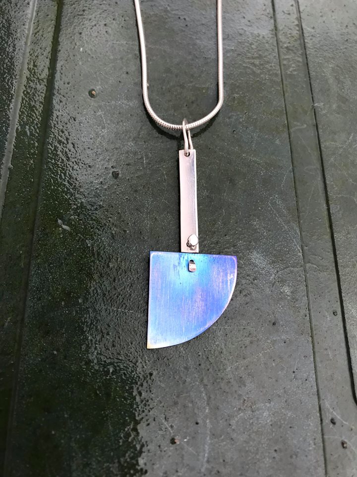 Silver and blue titanium drop necklace